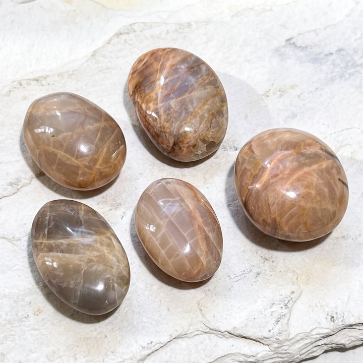 Peach Moonstone Flashy Palm Stone Carving
